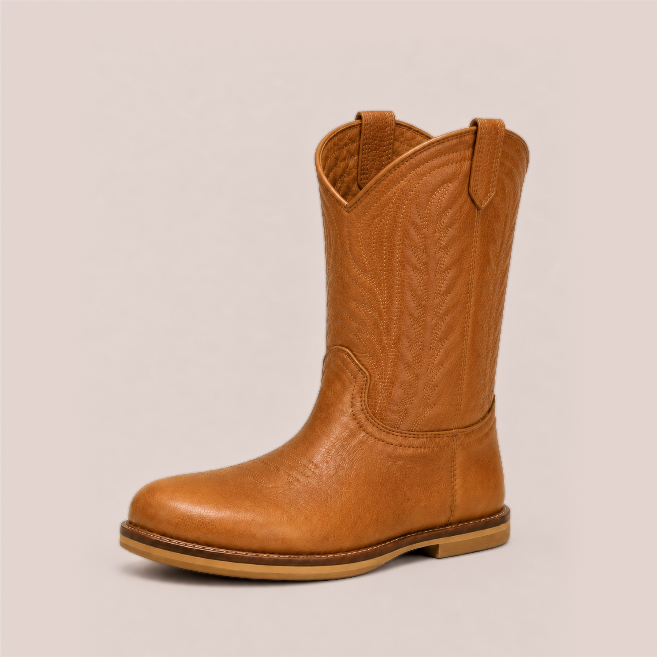 Side-angle view of the caramel kids' western boot with a broad toe, low heel, and a level sole.